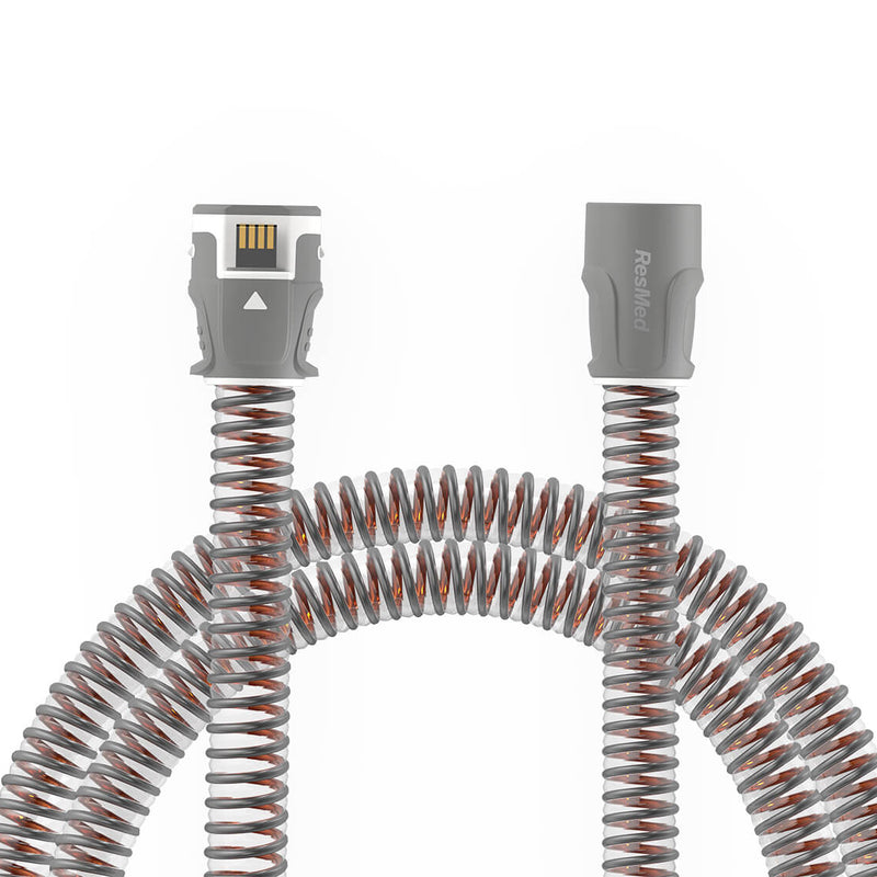 CPAP Tubing Climateline 11 on white background. The ends of the tubes are exposed.